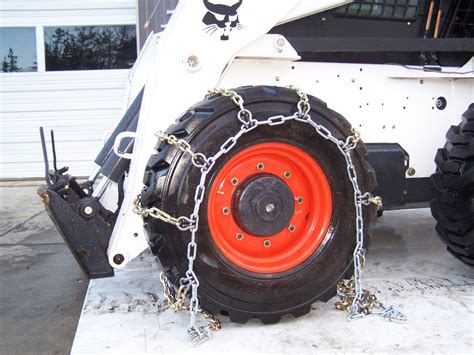 tracks or chains on skid steer|skid steer snow chains.